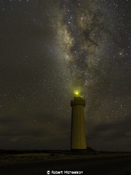 The Milky Way at the lighthouse on Bonaire by Robert Michaelson 